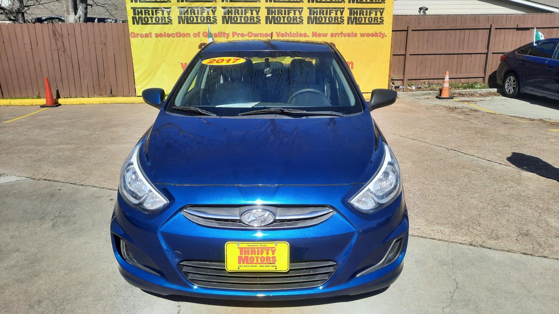 2017 Blue /Gray Hyundai Accent SE 4-Door 6M (KMHCT4AE1HU) with an 1.6L L4 DOHC 16V engine, Automatic 6-Speed transmission, located at 16710 Clay Rd., Houston, TX, 77084, (281) 859-7900, 29.834864, -95.656166 - Photo#1